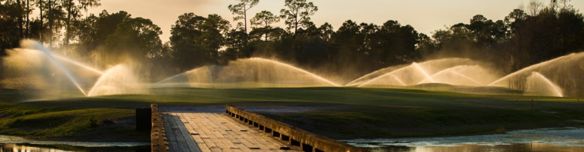 Sprinklers water the course at Timacuan Golf and Country Club